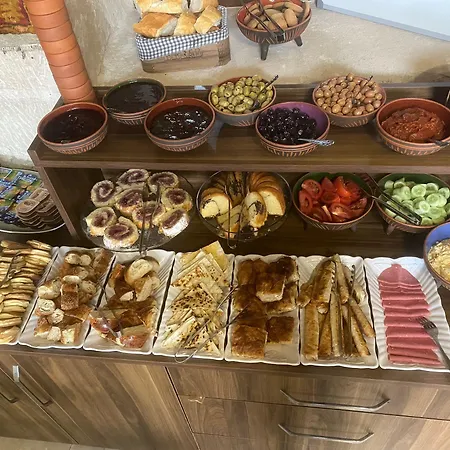 فندق Avlu Cave House *